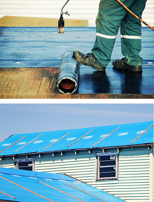 Technician using roofing torch